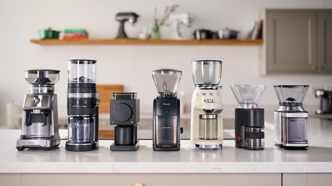 The best burr coffee grinder options for home lined up on a kitchen counter